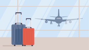 空港にある赤とグレーの2つのスーツケース