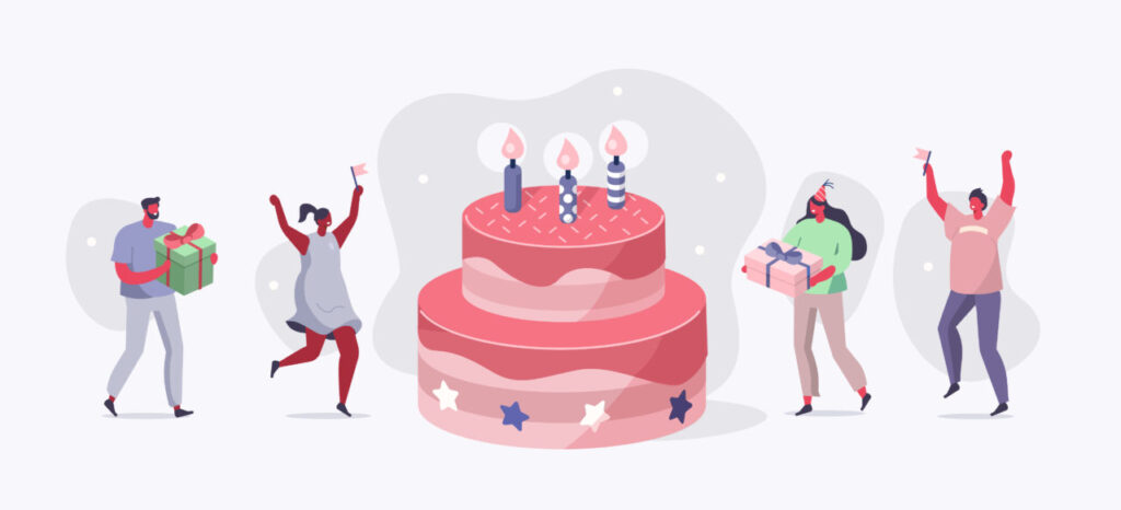 誕生日ケーキを囲んでお祝いする男女